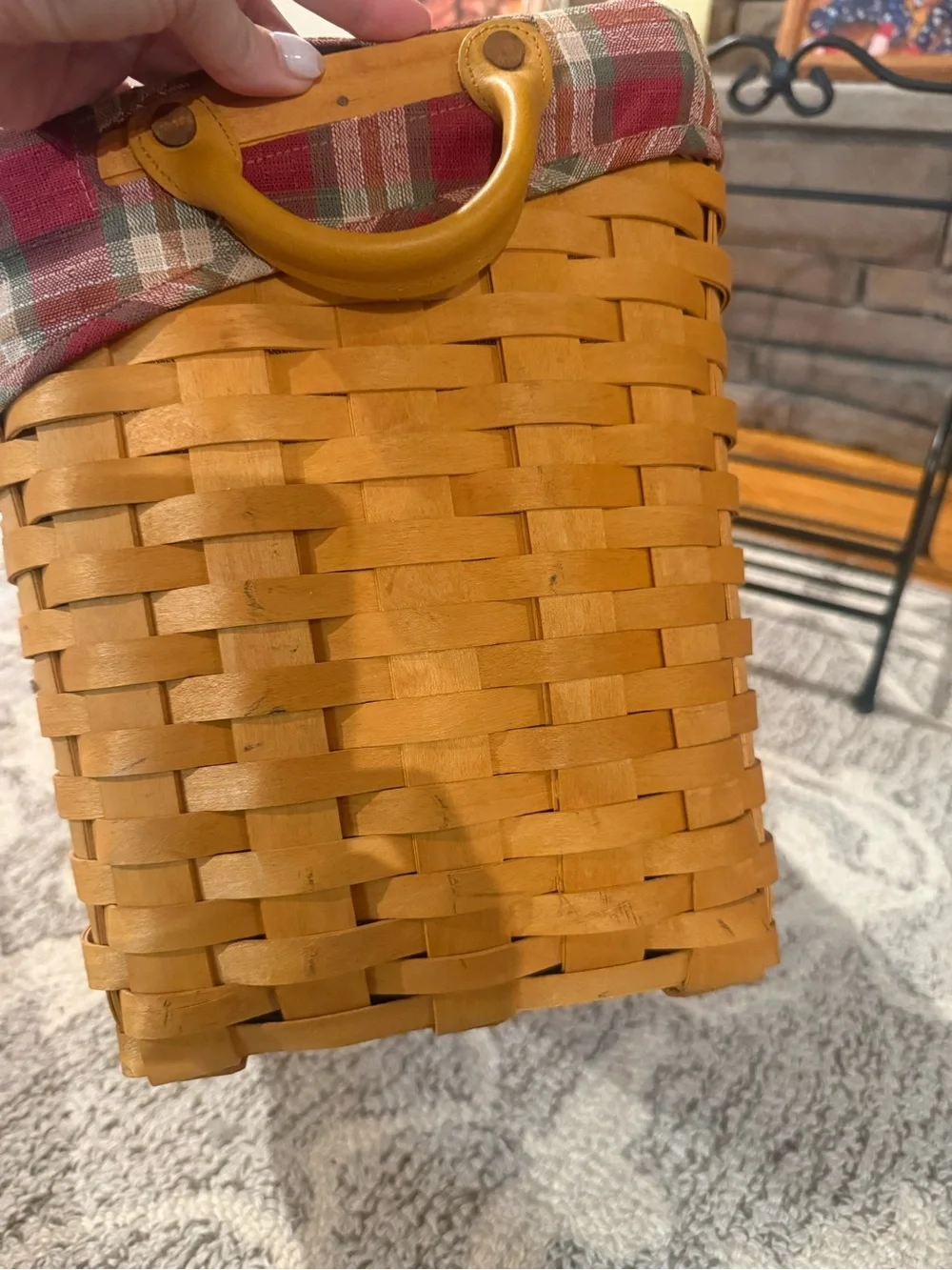 Longaberger newspaper basket. With lid , liner and wrought iron stand
